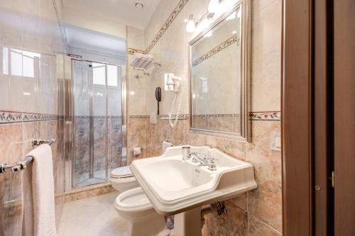 Koupelna v ubytování Hotel Artorius