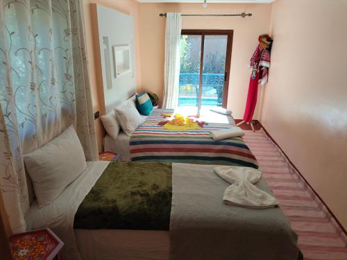 Cama o camas de una habitación en Riad otos views