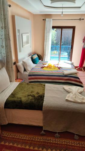 Cama o camas de una habitación en Riad otos views
