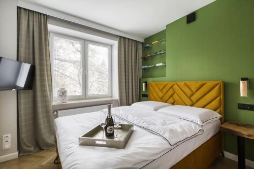 Posteľ alebo postele v izbe v ubytovaní Piękny Apartament Fredola