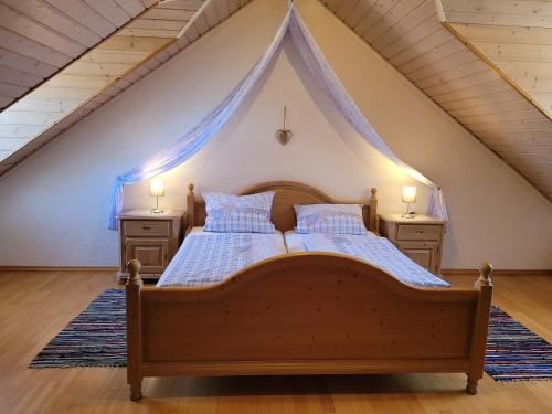 a bedroom with two beds in a attic at Bauernhof Nißl in Neunburg vorm Wald