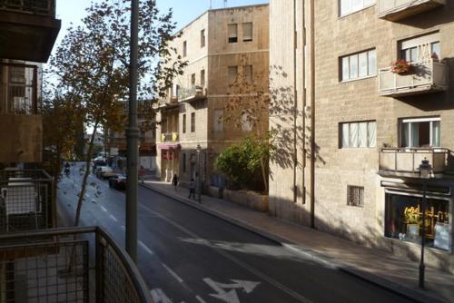 a view of a city street with a building at Segal in Jerusalem Apartments in Jerusalem