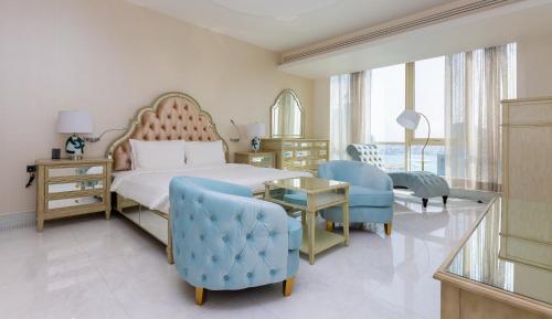 Postel nebo postele na pokoji v ubytování Ezdan Hotel West Bay