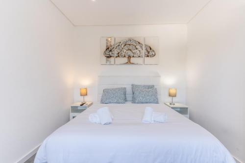 Postel nebo postele na pokoji v ubytování #110 Nightlife Center in NewTown, 500 mts Beach