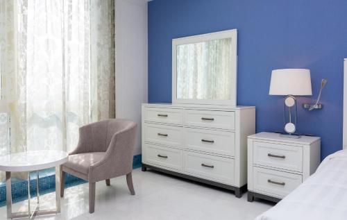 Postel nebo postele na pokoji v ubytování Ezdan Hotel West Bay