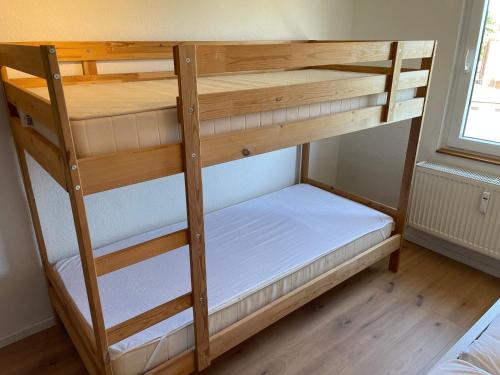 a couple of bunk beds in a room at Elfi in Goldberg