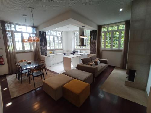 a living room with a couch and a table at CASA DE PERAIS in Perais