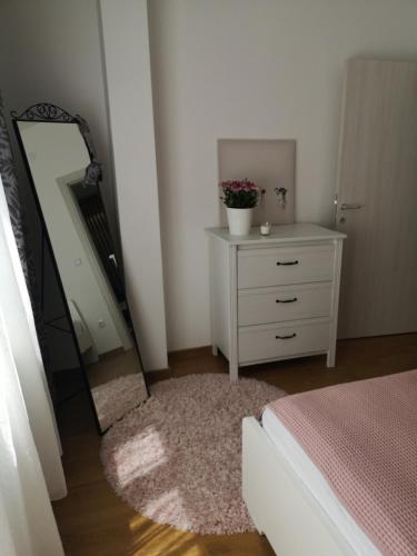 Кровать или кровати в номере Dimiant Lux Apartment
