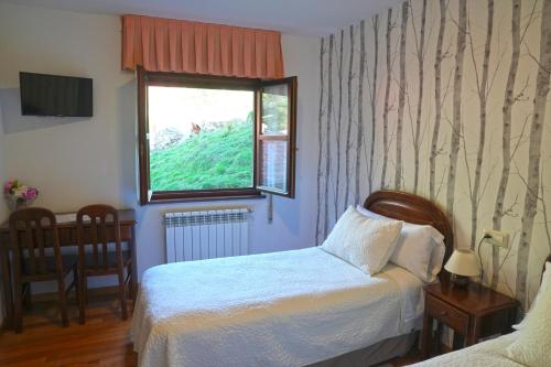 Postel nebo postele na pokoji v ubytování Casa La Quintana