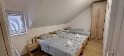 Postel nebo postele na pokoji v ubytování ANA Apartment