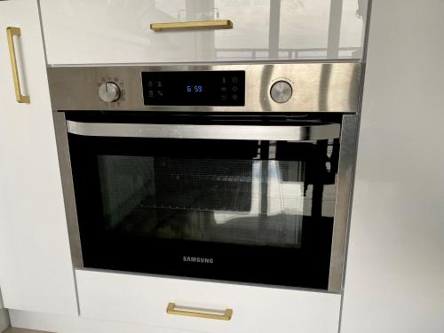 Kuchyň nebo kuchyňský kout v ubytování Widok na Morze Porta Mare - Apartament 339