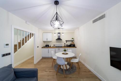 Kuchyň nebo kuchyňský kout v ubytování Apartamentos San Lazaro