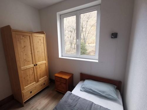 Postel nebo postele na pokoji v ubytování Appartements au bord de la rivière