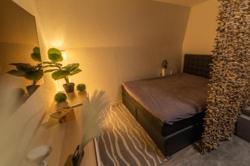 Postel nebo postele na pokoji v ubytování Fewo Thermal Bad Saarow