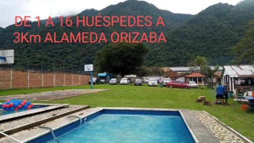 a sign that reads de a hospitals akm alkameda orabase at Multialojamientos Pico de Orizaba in Orizaba