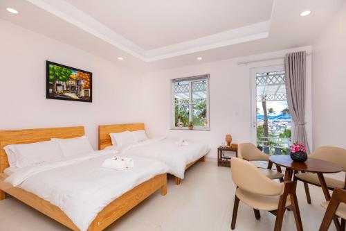 Giường trong phòng chung tại Villa Trung Nghĩa 31