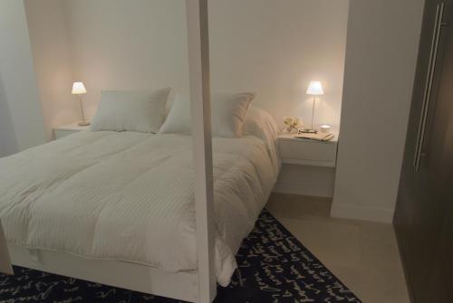 Yoo Punta del Este - Rental Club Apartmentsにあるベッド