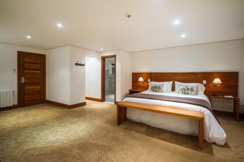 Cama ou camas em um quarto em L.A.H. Hostellerie