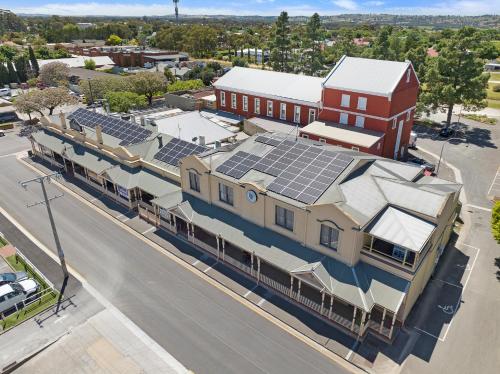 an overhead view of a building with solar panels on it at The Tanunda Club Guest Suites in Tanunda