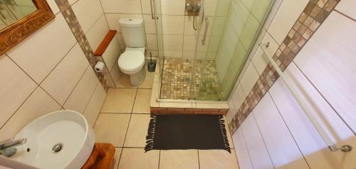 a small bathroom with a shower and a toilet at Chesapeake Bay 48 - Sleeps 5 - Ideal Location in Margate