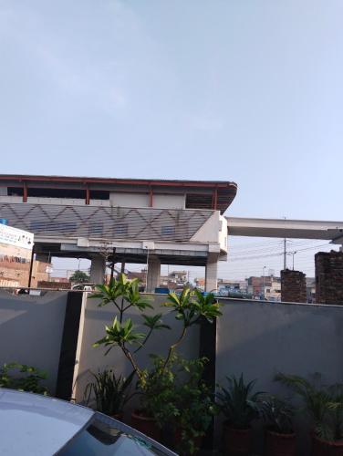 a view of a building from a rooftop at 1 Kanal Entire House with 4 Bedrooms in Lahore