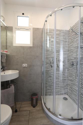 a bathroom with a shower and a sink at Pietro's house in Rome