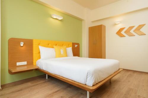 Cama o camas de una habitación en Bloom Hotel - Sector 62