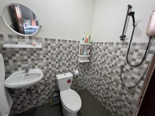 a small bathroom with a toilet and a sink at Holiday house near Lamai with swimming pool. 2 bedrooms in Nathon Bay