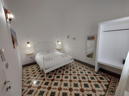 Ένα ή περισσότερα κρεβάτια σε δωμάτιο στο Alli Rotti Guest House