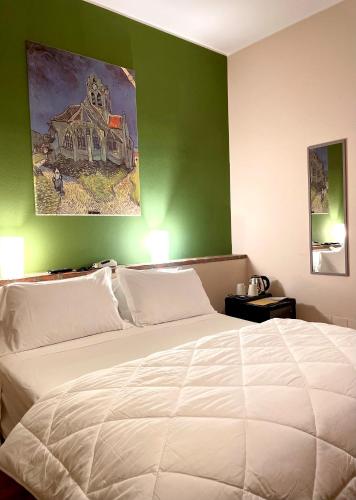 Ένα ή περισσότερα κρεβάτια σε δωμάτιο στο Hotel-Motel70