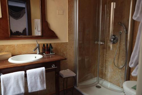Kúpeľňa v ubytovaní Novecento Boutique Hotel