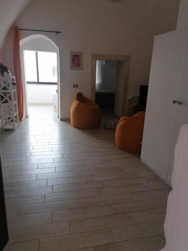 a room with two bean bags on the floor at Albero di giada in Massafra