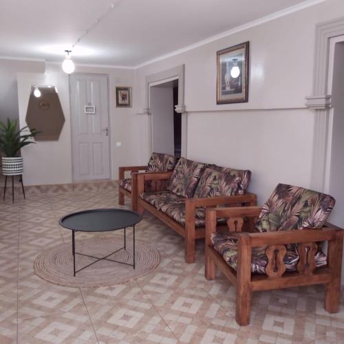 Coin salon dans l'établissement Guesthouse of Manoni Ratiani