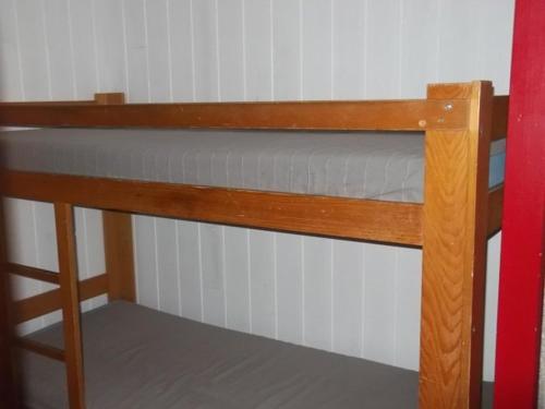 a small bunk bed in a small room at Appartement Orcières Merlette, 1 pièce, 6 personnes - FR-1-262-123 in Forest des Baniols