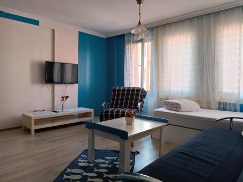 Televiisor ja/või meelelahutuskeskus majutusasutuses The City Residence Hotel