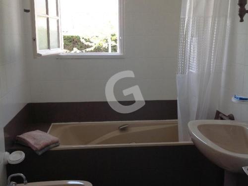 a bathroom with a bath tub and a sink at Maison Saint-Vincent-sur-Jard, 4 pièces, 6 personnes - FR-1-357-32 in Saint-Vincent-sur-Jard