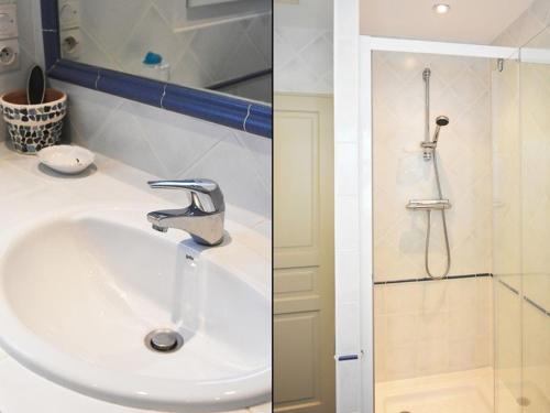 a bathroom with a sink and a shower at Maison spacieuse avec jardin, cheminée, internet et lits faits à l'arrivée - Les Portes-en-Ré - FR-1-434-10 in Les Portes