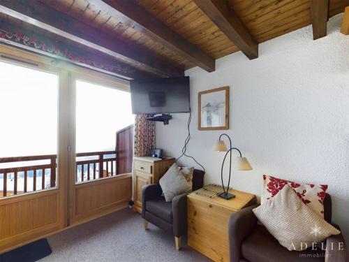 Appartement Montvalezan-La Rosière, 3 pièces, 6 personnes - FR-1-398-529にあるシーティングエリア