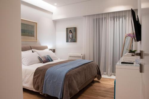 Posteľ alebo postele v izbe v ubytovaní Katia Modern Apartment in Athens