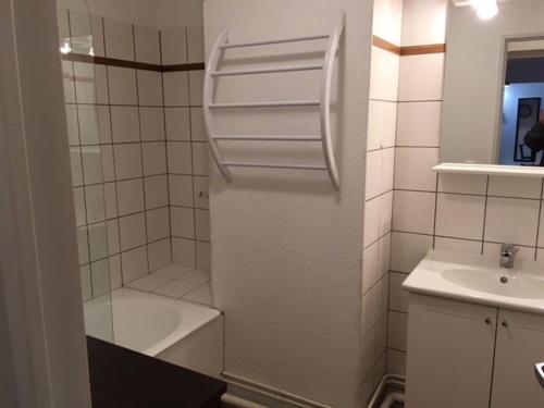 a small bathroom with a sink and a refrigerator at Appartement La Mongie, 3 pièces, 4 personnes - FR-1-404-200 in La Mongie