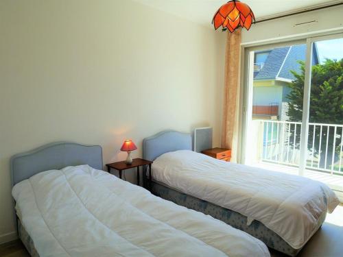 Säng eller sängar i ett rum på Appartement Quiberon, 2 pièces, 4 personnes - FR-1-478-140