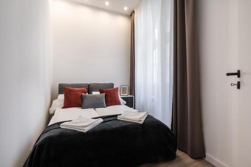 Postel nebo postele na pokoji v ubytování KL26- Quality Apartments, Best Location. By BQA