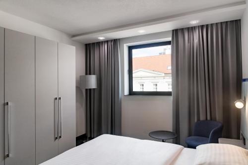Postel nebo postele na pokoji v ubytování Park Inn by Radisson Danube Bratislava