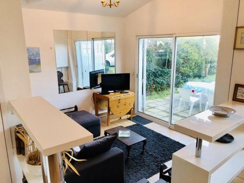 Maison conviviale à Arcachon-le-Moulleau, à 150m de la plage, jardin, parking, 2 chambres
