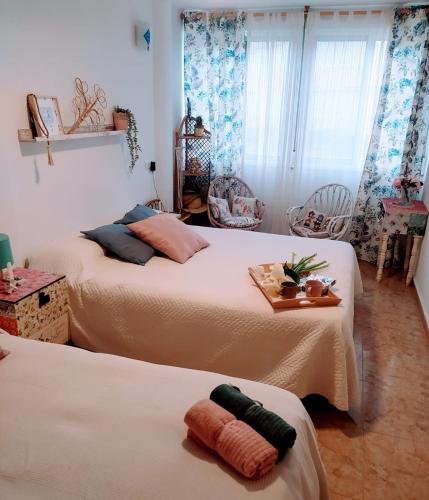 Postel nebo postele na pokoji v ubytování Apartamento coqueto