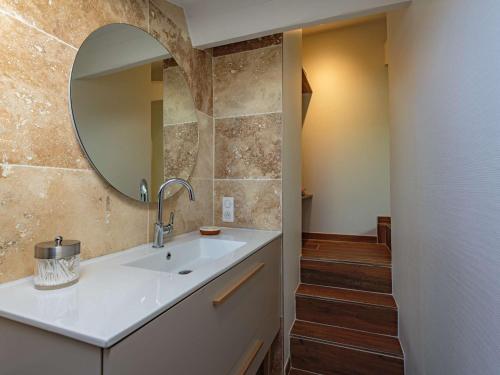 a bathroom with a sink and a mirror at Appartement Saint-Jean-de-Luz, 4 pièces, 6 personnes - FR-1-4-590 in Saint-Jean-de-Luz