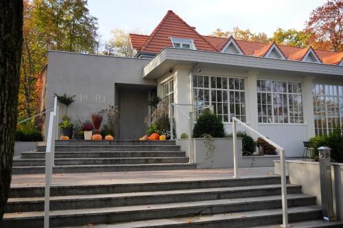 a house with pumpkins in front of it at Port Sołacz in Poznań