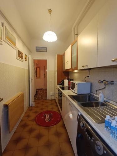 Cucina o angolo cottura di Le Palme 98 "Casa Vacanze"