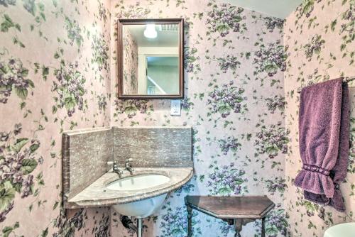 a bathroom with a sink and a mirror at Historical Portland Home Less Than 2 Mi to Downtown! in Portland
