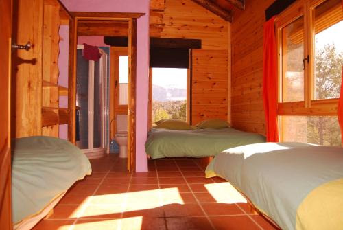 En eller flere senger på et rom på La Cicuarala